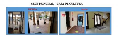Imagen de la señalización de entrada y salida en la sede de la UP de la Casa de Cultura