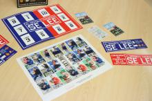 Álbum de cromos, marcapáginas y calendarios de la campaña de fomento de la lectura 'El deporte también se lee'